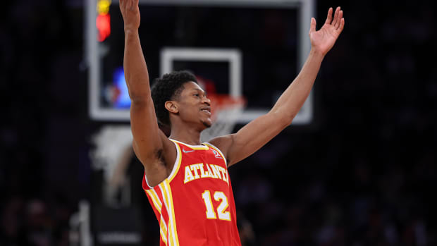 Atlanta Hawks forward De'Andre Hunter reacts to made shot.